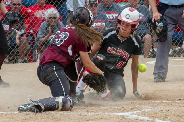 Emma Baalman scores a run for Calhoun. (Photo courtesy of Michael R. Weaver)