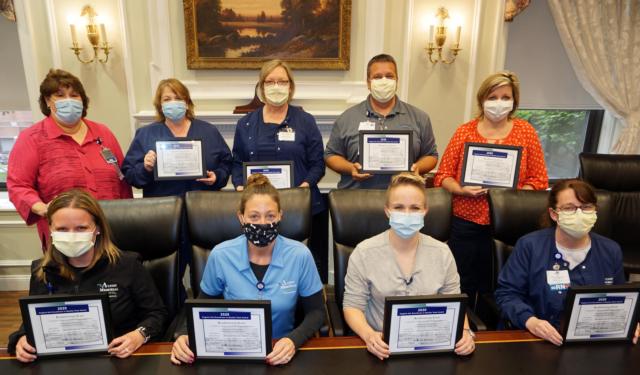 The Readmission Team is the winner of this year's Virginia Ilch Team Service Award. Team members include, front row left to right, Jamie Goss, Angie Liley, Kaitlin Lodes and Jamie Bock; back row left to right, Debbie Turpin, Cindy Bray, Dr. Angela Holbrook, Jason Bowman and Penny Krause. Not pictured are Susan Koesterer, Sherri Henson, Dr. David Harmon, Dr. John Pargulski, Heidi Noel, Cassie Judkins and Amy Schuler.