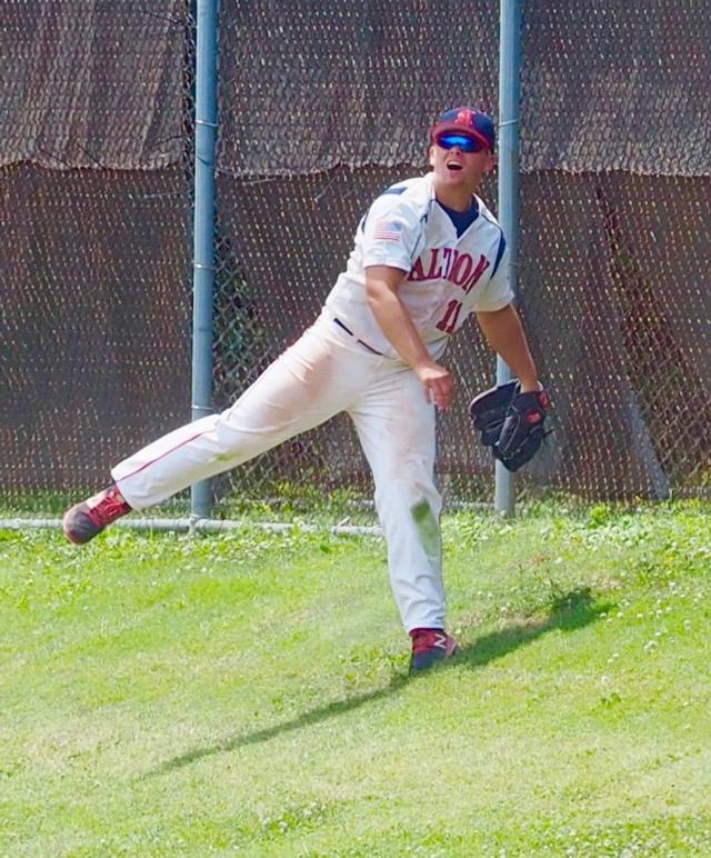 Ryan Best throws the ball back into the field after base hit by Eureka.