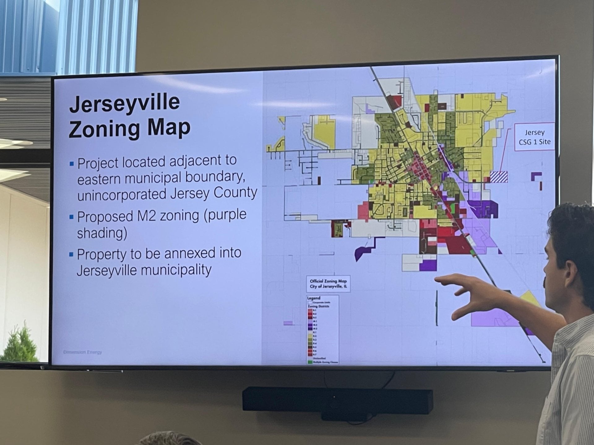 Paul Irby with Dimension Energy highlights a zoning map of Jerseyville, with the solar farm project area shown on the city's eastern boundary.