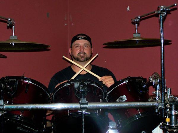Johnny Gleason in his favorite place - behind a set of drums.