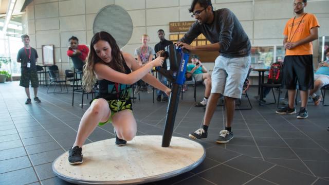 Shelby Pigg, of Sandoval, tries out a hovercraft during SIUE Engineering Camp.