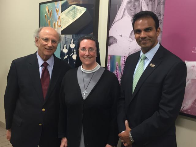Dr. Dale Chapman, President of Lewis and Clark Community College and Community Board Member of OSF Saint Anthony's Health Center, meets with Sister M. Mikela, Executive Vice President of OSF HealthCare, and Ajay Pathak, President of OSF Saint Anthony's, at Discovery by Design: An OSF Innovation Event in Peoria.
