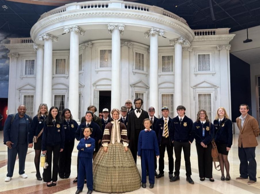 Edwardsville FFA members with Lincoln family statues at the Abraham Lincoln Presidential Museum and Library. Left to right: Michael Hubbard, Macie Wilkinson, Elizabeth Dungan, Angie Nuñez, Caitlyn Stafford, Hunter Touchette, Dylan Henke, Lucas Wilkinson, Austin Manley, Mason Morfey, Kolson Bruhn, Lucy Heepke, Brooklyn Elliott, Joseph Birrittier.