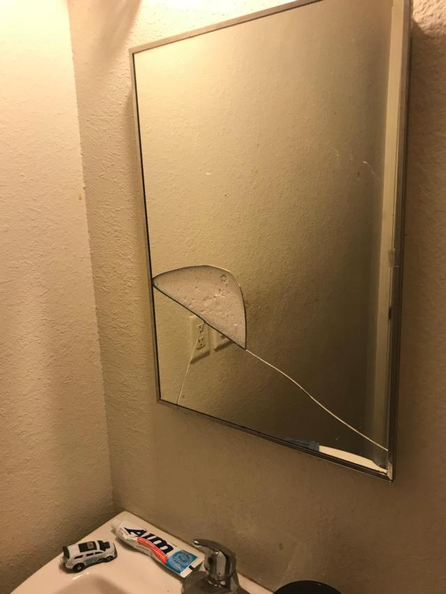 A mirror in an apartment condemned was cracked.