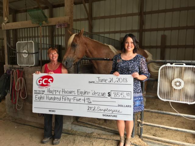 Mary Evans (Founder of Happy Hooves Equine Rescue), Spirit (Happy Hooves Horse), and Sarah Gebke (GCS Community Relations Representative).