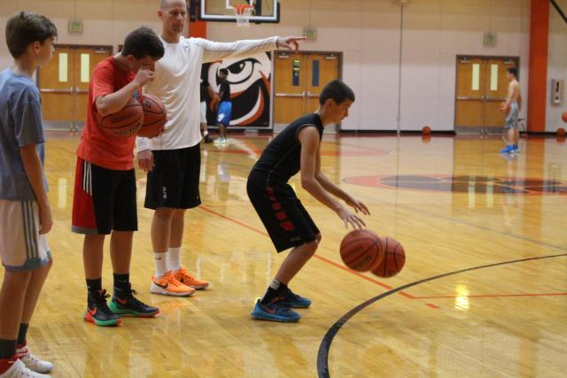 Athletes practiced their dribbling and screening on Wednesday at the camp. 