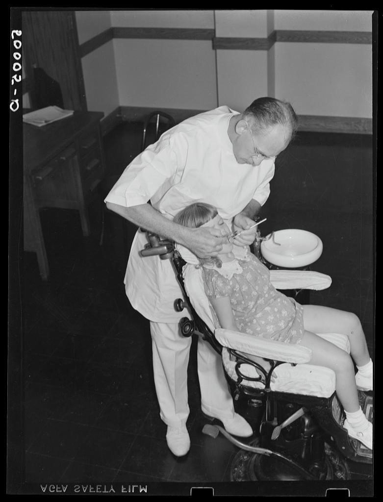 Preschool examination and check up in dental clinic at Greenbelt, Maryland Library of Congress Prints and Photographs Division, LC-USF34- 050005-D [P&P] LOT 1361 (corresponding photographic print) LOT 2316 (corresponding photographic print)