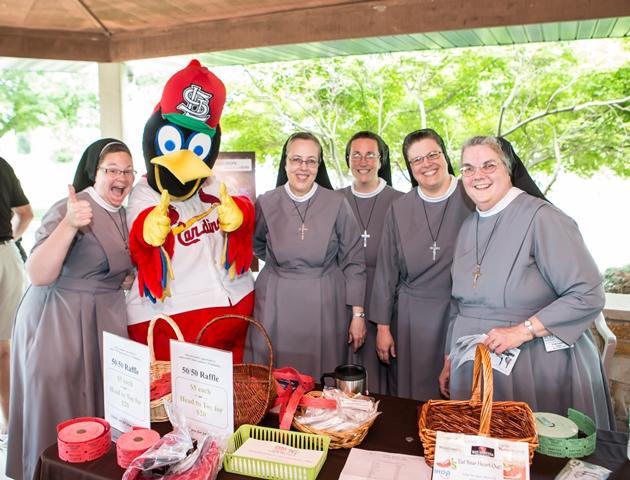 Fredbird takes a moment for a photo op with the Sisters of St. Francis of the Martyr St. George during OSF Saint Anthony’s Foundation 15th Annual Golf Tournament. The tournament, held at Spencer T. Olin, raised over $80,000 for OSF Saint Anthony’s Cancer Center of Excellence.