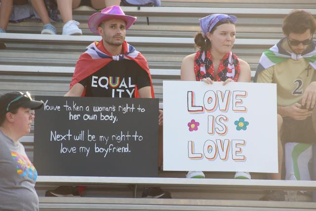 These fans showed up with these signs after the fallout of the Roe v. Wade case. 
