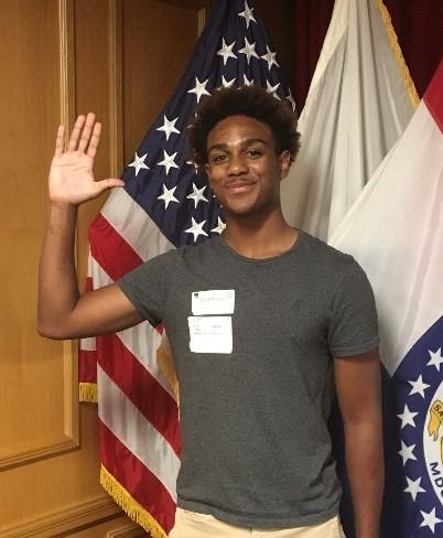 Pvt. Brenden Canada of Belleville, Illinois poses for a photo at the St. Louis Military Entrance Processing Station June 23. Canada enlisted as a 35F, Intelligence Analyst, and will be assigned to Company D, 766th Brigade Engineer Battalion based in Bloomington, Illinois. (U.S. Army photo courtesy of Illinois Army National Guard Recruiting and Retention Command)