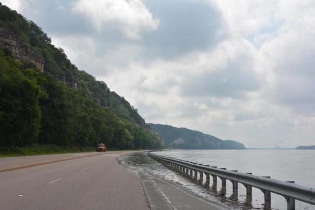 Mississippi River water spilled out on the Great River Road outside Alton on Monday morning. (Photo by Dan Brannan)