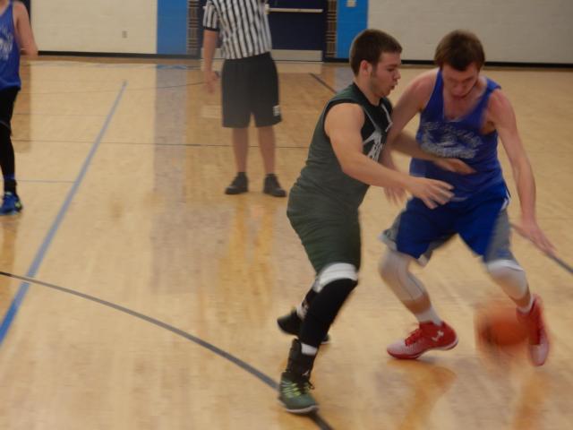 Carrollton's Luke Gillingham goes for the ball in a summer basketball game at White Hall this week. Gillingham has been a star for Carrollton through the summer and the Hawks' coaches have high expectations for him this winter. (Photo by John Hough)