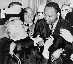 President Lyndon B. Johnson signed the Civil Rights Act into law on July 2, 1964.