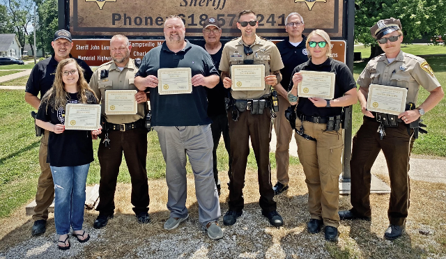 Law Enforcement Officials recognized for their participation in a multi-agency investigation which led to the identification and apprehension of a suspect who committed a string of burglaries. 