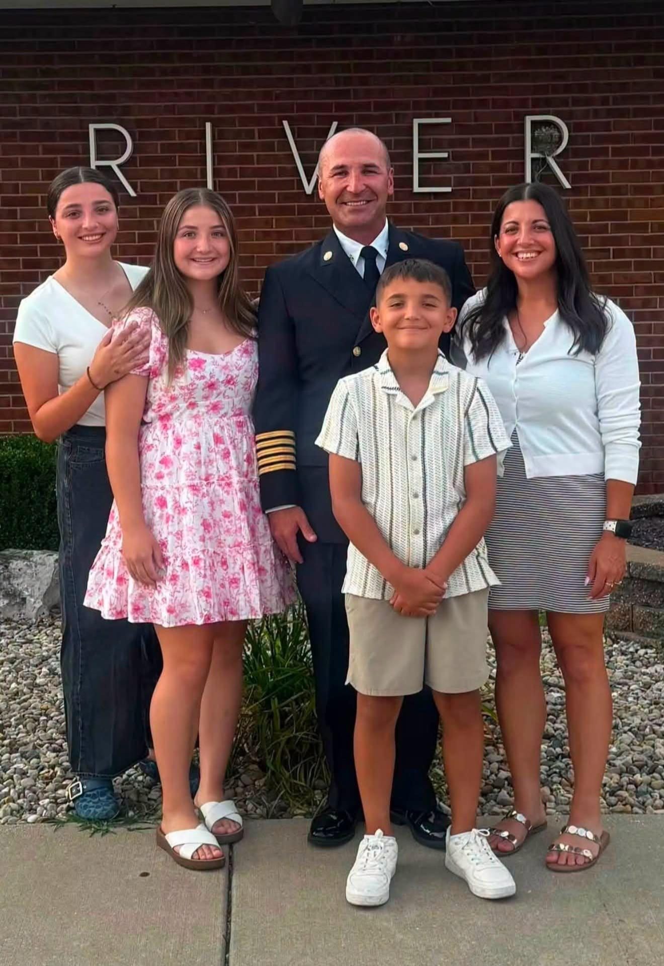 Wood River Fire Chief Nate Kamp and family.