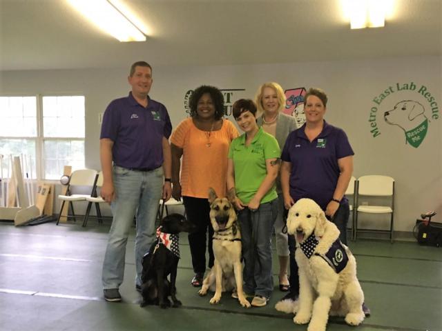 (From left to right: Alan Pennington, board president of Got Your Six Support Dogs; Veronica Armouti, auxiliary board member of United Way of Greater St. Louis &ndash; Southwest Illinois Division; Nicole Lanahan, executive director of Got Your Six Support Dogs; Maura Wueller, director of United Way of Greater St. Louis &ndash; Southwest Illinois Division; and Kelly Felax, board secretary of Got Your Six Support Dogs.)