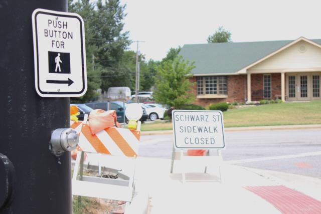 Signs posted on the Schwarz Street Project. (Photo by Steve Spencer)
