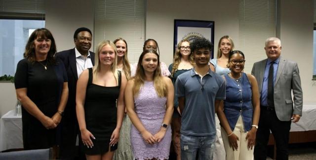 Front Row: Dr. Tricia Blackard, Elise Berry (Roxana High School), Savanah Heinle (Triad High School), Kameron Hildebrand-Johnson (Edwardsville High School), and Wren Crawford (Alton High School). Back Row: Dr. Ed Hightower, Jordan Ealy (East Alton – Wood River High School), Tyra Wells (Alton Marquette High School), LilyRose Cockrum (Granite City High School), Emily Phillips (Alton High School), and Dr. Robert W. Werden. Not Pictured: Jayna Halley (Civic Memorial High School) and Addyson Moore (Edwardsville High School).