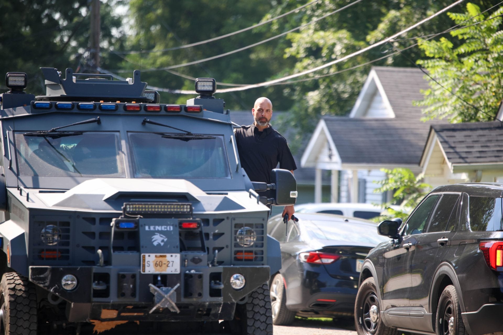 Officers at the scene on Leonard Street on Thursday morning. (Photos by Chris Rhodes).