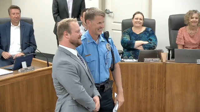 New Edwardsville Police Officer Kevin Douglas (left) stands with Edwardsville Police Chief Michael Fillback (right)