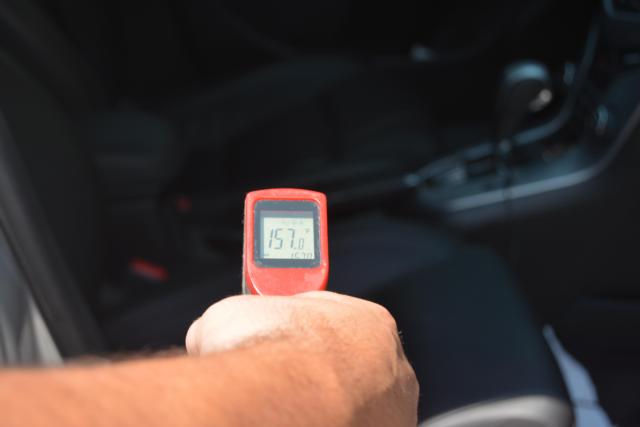 A car in Downtown Alton showed a 157-degree temperature Friday afternoon with an infrared thermometer.
