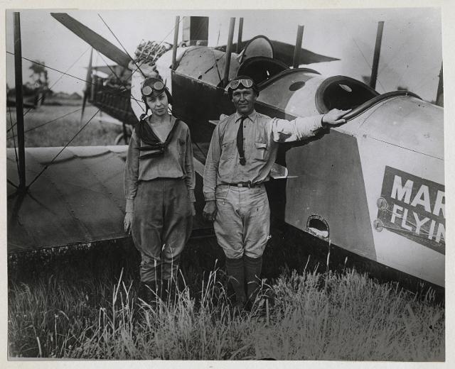 Marie Meyer and Charles Fowler of the Marie Meyer Flying Circus standing beside their airplane. Missouri Historical Society. Identifier: P0059-00001