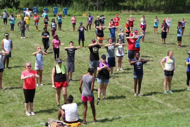 The members of the Marching 100 step prepare to move to the next set of their field show routine.