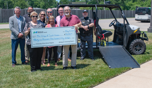 PICTURED (left to right): ACT Executive Director SJ Morrison, South Roxana Police Chief Bob Coles, South Roxana Mayor Barbara Overton, ACT Board Members Chrissy Wiley, Ron Jedda, Lisa Ciampoli, Patrick McRae and Mark Achenbach, and South Roxana Police Lieutenant Brian Doyle.