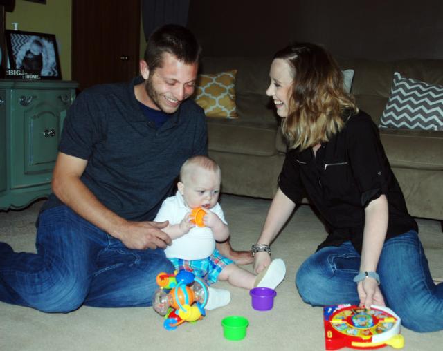 Cam Talley, who turns 1 year old in September, plays in his Jerseyville home with his parents, Chris Talley and Molly Rowling.