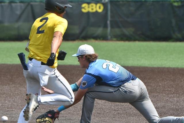 A first base play in the Jerseyville-Danville Junior Legion State Championship matchup on Sunday at Gordon Moore Park. (Photos by Dan Brannan).
