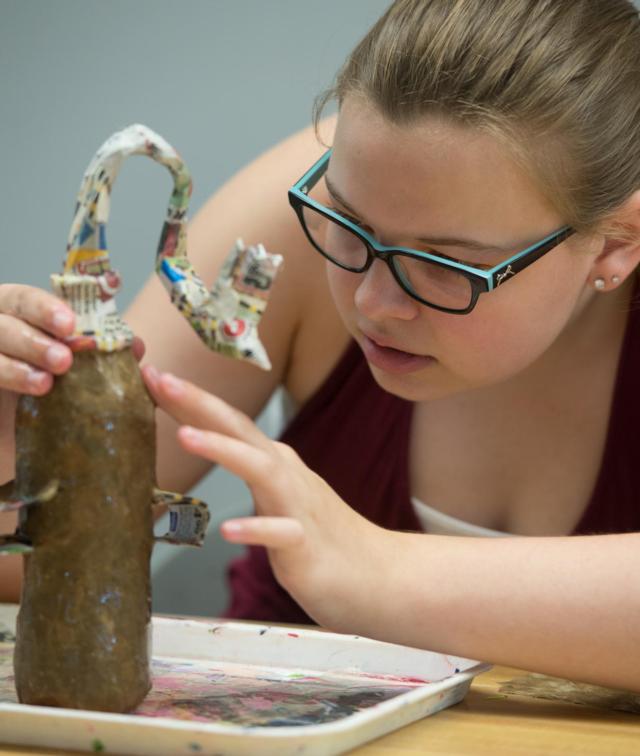 Christine Blackwell, of Bethalto, concentrates on her artwork.