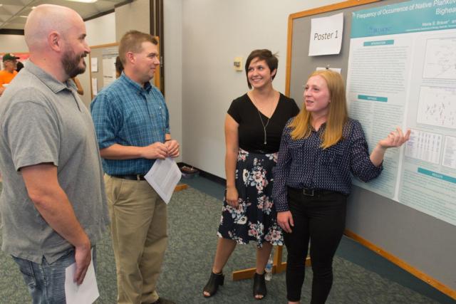 Maria Brauer, a rising junior from Belmont University and Jennifer McBride, a rising junior from SIUE, present their findings at the REU Symposium.