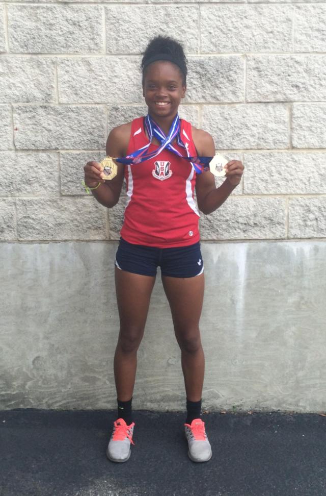 LaJarvia Brown with her two national championship medals in Norfolk, Va.