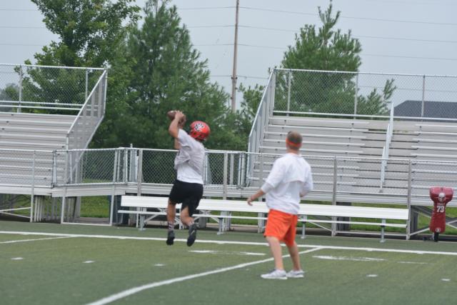 A.J. Epenesa runs a pass pattern at the Monday practice.