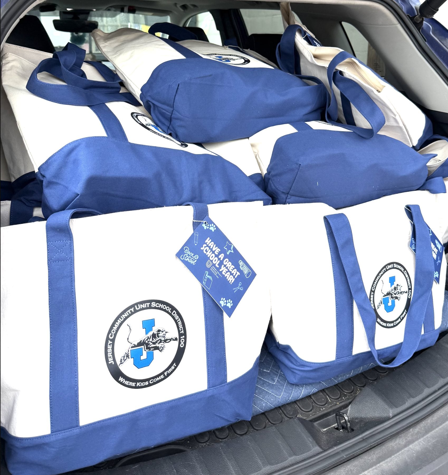 Totes filled and ready to be dropped off and presented to new Jersey School District employees.
