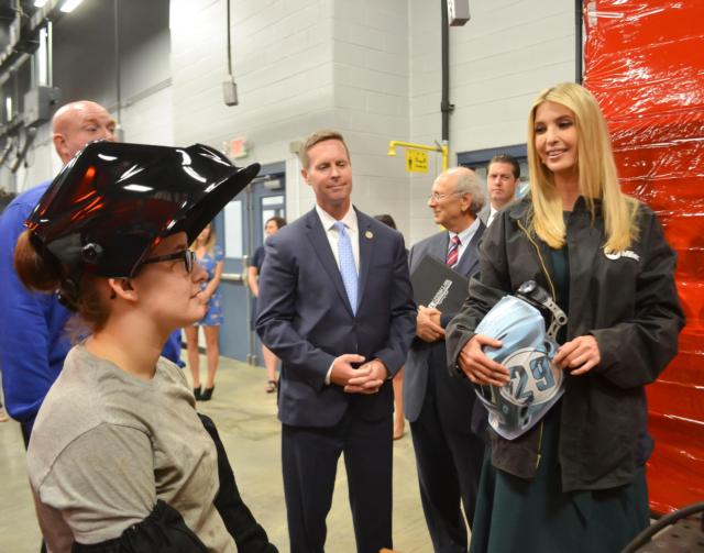 Assistant to the President Ivanka Trump and Congressman Rodney Davis toured the Weber Workforce Center Wednesday, Aug. 8, during Davis&rsquo; Workforce Roundtable event on Lewis and Clark Community College&rsquo;s Godfrey Campus. Trump tried her hand at welding during the tour and is shown here speaking with L&C Welding Alumna Isabella Stockton. Photo by Tom Atwood, Tom Atwood Media