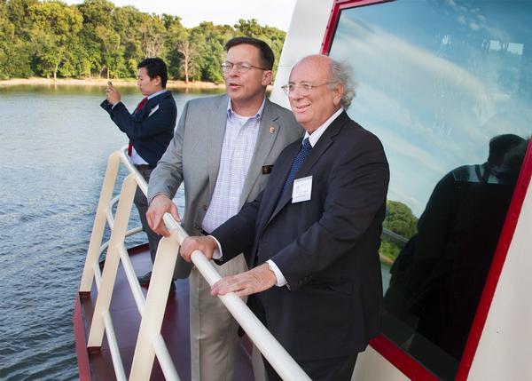 Major G eneral John Peabody and Lewis and C lark President Dale C hapman discuss the partnership between NGRREC and the Mississippi River C ommission on board the Motor Vessel MISSISSIPPI on Aug. 15. Photo by S. Paige Allen, L&C Photographer