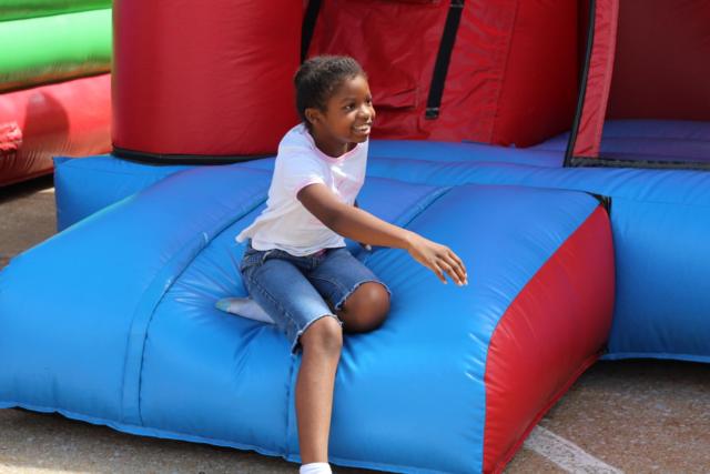 Children enjoyed several bounce houses lining Market Street in Alton.