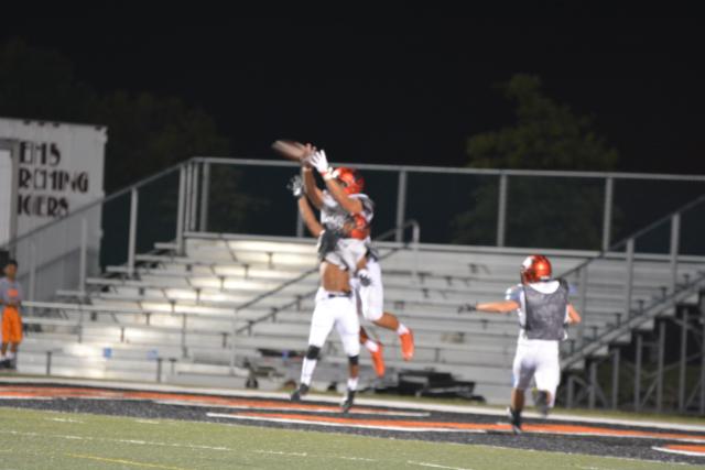 A.J. Epenesa catches a touchdown reception during the Orange and Black Scrimmage on Friday night.