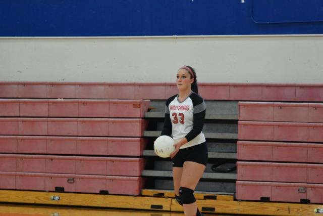 Bunker Hill's Allysa Austill prepares to serve against Calhoun on Tuesday night. (Photo by Dan Brannan)