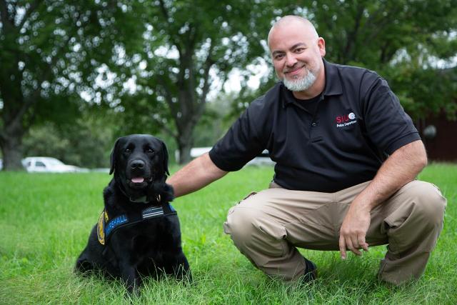 SIUE’s Police Department electronic detection K9 Marshall and his handler Detective Sergeant Dave Baybordi.