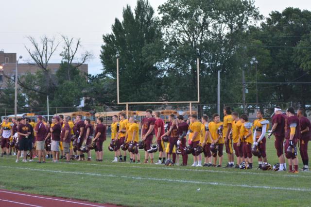 The East Alton-Wood River Oilers stand on a line on their home field. (Photo by Dan Brannan)