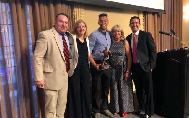 Devyn Jambga is presented with the 2018 Jack Blake Award