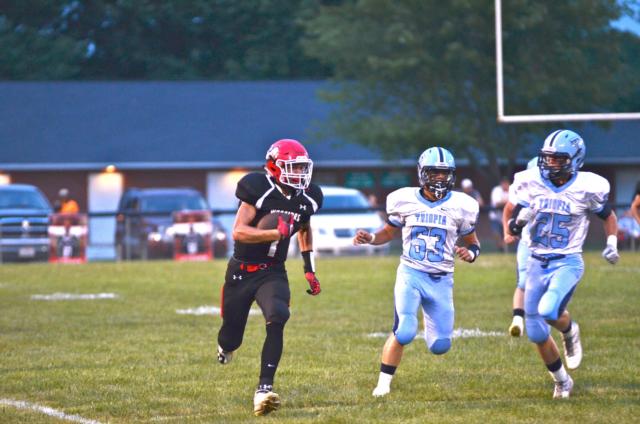Wes Klocke runs in a touchdown in Friday night's game. Photos courtesy of Angie Kizer.