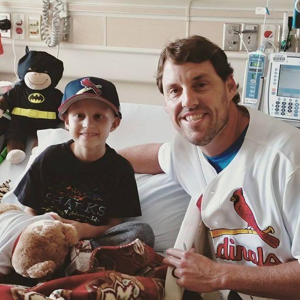 Jonny Wade, photographed with St. Louis Cardinal's pitcher John Lackey, in his visit to Wade's bedside while receiving treatment. 