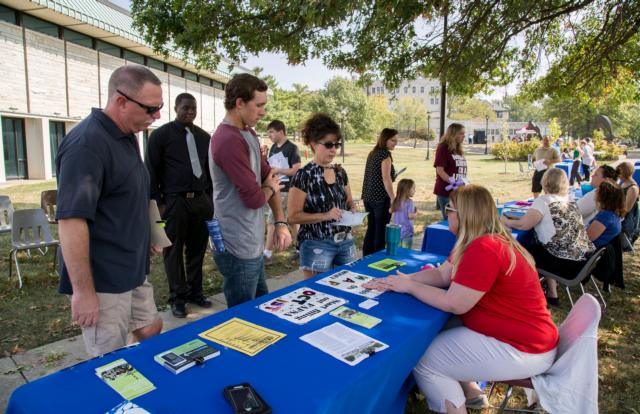 Students and their families discuss financial aid options with L&C staff during Lewis and Clark Community College’s Fall 2017 Discover Day event. Photo courtesy of Lewis and Clark Community College