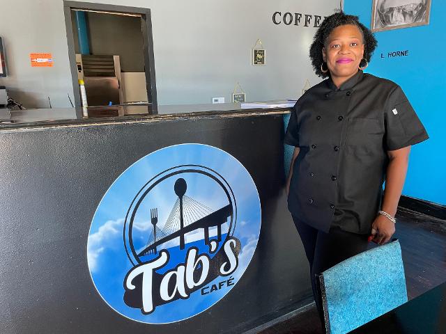 Tabitha Craig-Robinson, the owner of Tab's Cafe, is ready for her 10 a.m. opening on Saturday. (Photos by Dan Brannan)