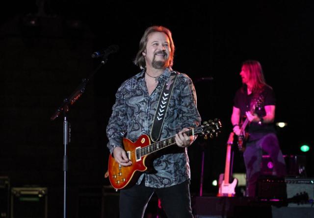 The smile on his face tells it all, country star Travis Tritt still enjoys performing and his fans. Tritt provided last memories and a trip back in time for fans Friday night in Alton. (Photos by Madelaine Gerard)