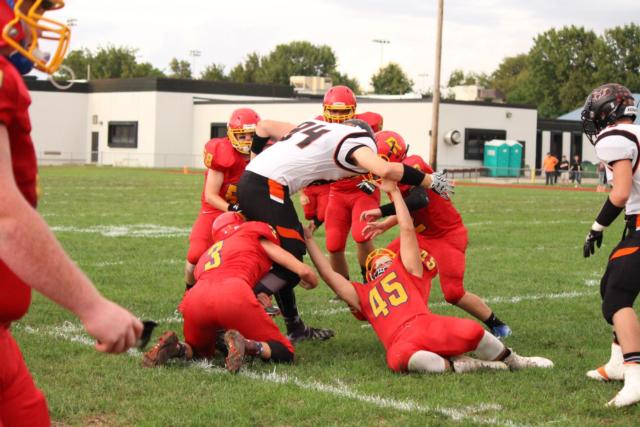 Roxana's defense upends their Vandalia foes on Friday night. (Photo by Madelaine Gerard)